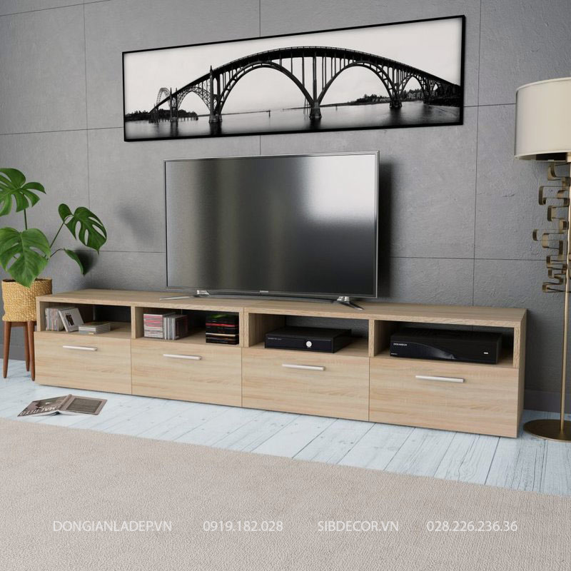 Kệ TiVi bằng gỗ đơn giản 2024: Với sự phát triển của công nghệ và thiết kế, kệ TiVi bằng gỗ đơn giản càng trở nên phổ biến và hấp dẫn hơn. Năm 2024 này, các mẫu kệ TiVi được thiết kế tinh tế, đa dạng về màu sắc, chất liệu và kích thước, giúp bạn dễ dàng sắp xếp và trưng bày những chiếc TV hiện đại của mình. Qua đó, tái tạo không gian sống sang trọng và thẩm mỹ hơn.

Translation: With the development of technology and design, simple wooden TV stands have become increasingly popular and attractive. In 2024, TV stands are designed with sophistication, diversity in color, material and size, making it easy for you to arrange and display your modern TVs. This will help rejuvenate living spaces to be more luxurious and aesthetic.