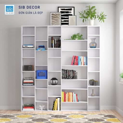 Kệ trang trí phòng khách hiện đại, phối nhiều ô đựng sách và đồ decor nhỏ tinh tế