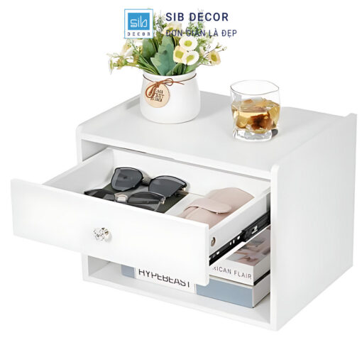 Kệ đầu giường treo tường màu trắng có ngăn kéo tiện lợi, đặt kính mắt và ví gọn gàng